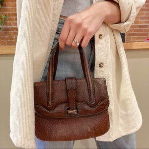 Small vintage dark brown leather purse